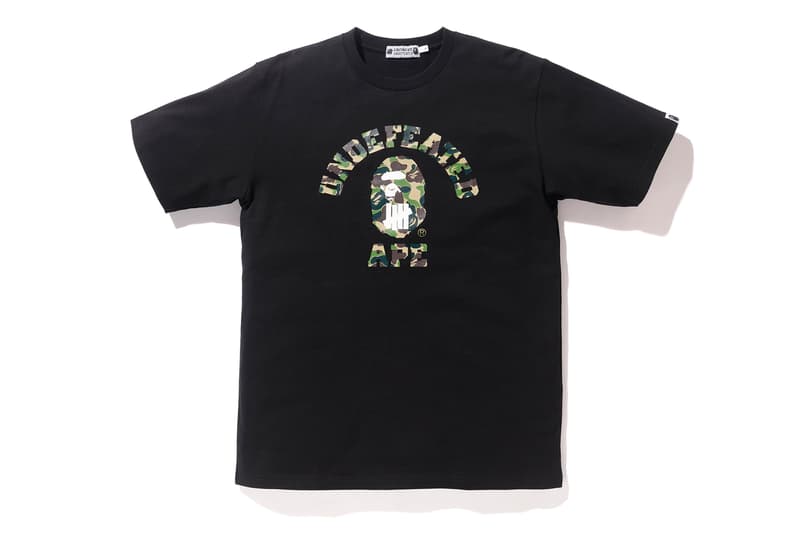 BAPE®️ x UNDEFEATED の強力タッグによるコラボカプセルコレクション第4弾が登場 両者のロゴをミックスしたインパクト抜群のM-65やスウェットセットアップは必見 カリフォルニア州 ロサンゼルス 旗艦店 A BATHING APE®️ BAPE®️ ベイプ ア ベイシング エイプ UNDEFEATED アンディフィーテッド APE HEAD ファイブストライクスロゴ グリーン パープル BAPE®️ CAMO M-65 フーディ Tシャツ スウェットパンツ 6ポケットパンツ James Bond ジェームス・ボンド 転売カルチャー HYPEBEAST ハイプビースト