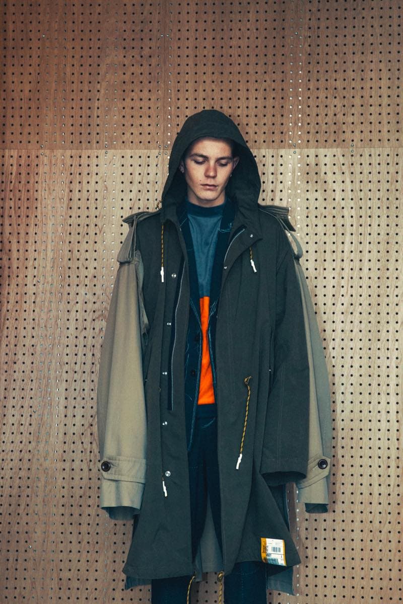 過去の作品を再解釈し新たな息吹を宿した Maison MIHARA YASUHIRO 2018年秋冬コレクション 変形トレンチコートを筆頭に現代のファッションシーンでもひと際異彩を放つ個性派アイテムが多数ラインアップ 多摩美術大学 シューズデザイナー 三原康裕 Maison MIHARA YASUHIRO メゾン ミハラヤスヒロ プロトタイプ Proto-Type 高橋ラムダ スタイリング 失敗作 分解/再解釈 ねじれのディテール アームホール 変形トレンチコート デニムジャケット リバーシブル仕様のキルティングコート レイヤード風 レザージャケット Converse コンバース ChuckTaylor HYPEBEAST ハイプビースト