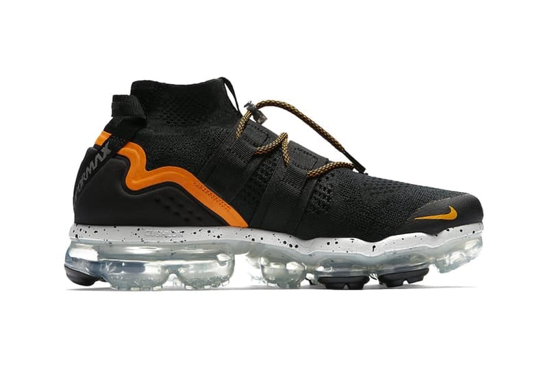 Nike よりアクティブな印象を放つ Air VaporMax Utility 新作モデル “Orange Peel” が登場 〈Nike〉の未来を担う次世代ハイブリットフットウェアの気になる発売日は…… Maximum Black HyperAdapt 1.0 Air VaporMax Plus Nike ナイキ Air VaporMax Utility Flyknitアッパー Nike ACG Pocket Knife DM トグル付きドローコード College Navy スペックル オレンジ Air VaporMax Utility“Orange Peel” NIKE.COM PIGALLE ピガール 2018年秋冬コレクション HYPEBEAST ハイプビースト