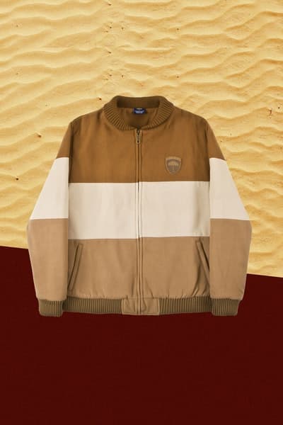 パリ発の注目スケートレーベル Hélas が2018年春のリリース第1弾 “Numero Uno” をリリース ルーカス・プイグらしいヒネリの効いたストリートウェアで構成される最新コレクションをチェックせよ HYPEBEAST ハイプビースト ヘラス 〈adidas Skateboarding（アディダス スケートボーディング）〉とアニメ風のビジュアルを採用したカプセルコレクションを展開したことも記憶に新しい、Lucas Puig（ルーカス・プイグ）主宰の〈Hélas（ヘラス）〉が、2018年春のリリース第1弾として“Numero Uno”を発表した。ルックブックやVHS調のキャンペーンビデオにも色濃く反映されているが、今季は古き良き80年代をヒントに、〈Palace（パレス）〉所属の同スケーターらしいヒネリの効いたユニークなプロダクトを展開する。  100%ウールコットンのファンジャケットは3段のカラーブロックが特徴的で、それにフックしたパンツも登場。また、デニムアノラックとトラックタイプの2型を展開するフード付きジャケットや、バックプリント入りのフーディ、ポロシャツなどもキーピースとして見逃せないアイテムだ。  “Numero Uno”コレクションは、現在『helascaps.com』にて販売中。サイズによっては品切れのものも出てきているので、気になる方はお早めに。  〈Supreme（シュプリーム）〉x〈UNDERCOVER（アンダーカバー）〉x Public Enemy（パブリック エナミー）のアイテム一覧やチルなムードを漂わせる〈Brotherhood（ブラザーフッド）〉のスプリングコレクションなど、その他の最新ファッションニュースもお見逃しなく。