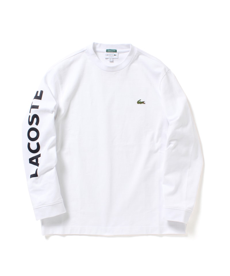 BEAMS が春夏シーズンのお伴に Lacoste のタイムレスな別注コレクションをリリース マリンなアイテムをワイドシルエット且つヘビーウェイトで仕上げた正真正銘のマストハブ メンズウェアを幅広く見渡してみても、〈Lacoste（ラコステ）〉はストリートヘッズから紳士な男性にまで愛される数少ないブランドのひとつだろう。そこで『BEAMS（ビームス）』は2018年春夏シーズンの一環として、文字通り“ワードローブのマストハブ”であるフランスの老舗ブランドに別注を依頼。“クラシックヨットクラブ”と題した本コレクションでは、素材に太番手の天竺を使用し、男らしいヘビーウェイトな仕上がりを意識して、ポロシャツ、S/S＆L/S Tシャツ、パーカの全4型を展開する。  マリンなアイテムをワイドシルエットに変更することで、ストリートにもがっちりハマる各アイテムは、現在『BEAMS』のオンラインストアで先行予約を受付中。グラフィカルなアイテムもいいが、程よく品もあり、持っておいて損はない別注なので、筆者からは前向きな検討をオススメしたい。  あわせて、“コマーシャル”と“広告”というキーワードのもとに製作された『BEAMS』x祐天寺の美容室『Guru’s Cut & Stand』のコラボコレクションもお見逃しなく。 オレンジ ネイビー カーキ ホワイト 白 ブラック 黒 HYPEBEAST ハイプビースト