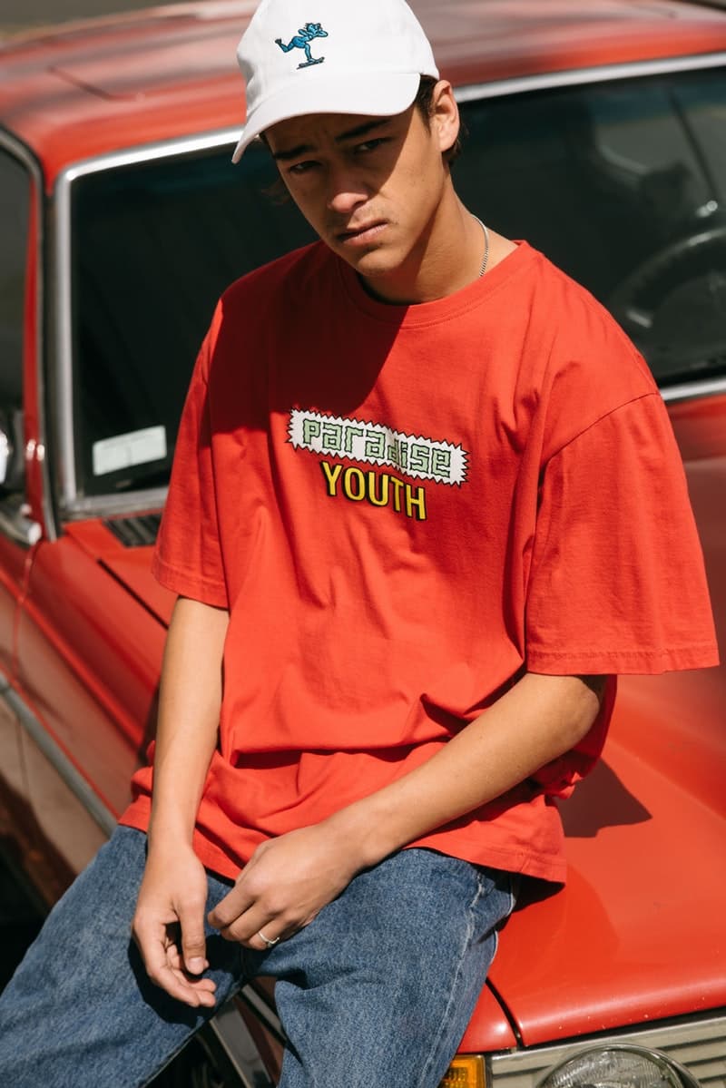 太陽を味方につけるエネルギッシュな色合いに包まれた Paradise Youth Club 2018年春夏ルックブック インドネシアの新興ブランドによるカレッジとストリートを融合させた多種多様なグラフィックデザインに注目 Dominate Jakarta ドゥミネート ジャカルタ インドネシア 新鋭ストリートブランド Paradise Youth Club パラダイス ユース クラブ 2018年春夏シーズン Utopian Frequency ユートピア周波数 エネルギッシュ レッド オレンジ イエロー ブルー カラーパレット コーチジャケット スウェットパーカ ロングスリーブTシャツ ボタンダウンシャツ＆ショーツ オンラインサイト Public Enemy パブリック エナミー Supreme シュプリーム UNDERCOVER アンダーカバー HYPEBEAST ハイプビースト