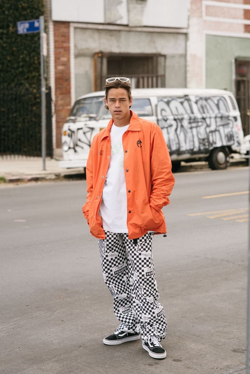 太陽を味方につけるエネルギッシュな色合いに包まれた Paradise Youth Club 2018年春夏ルックブック インドネシアの新興ブランドによるカレッジとストリートを融合させた多種多様なグラフィックデザインに注目 Dominate Jakarta ドゥミネート ジャカルタ インドネシア 新鋭ストリートブランド Paradise Youth Club パラダイス ユース クラブ 2018年春夏シーズン Utopian Frequency ユートピア周波数 エネルギッシュ レッド オレンジ イエロー ブルー カラーパレット コーチジャケット スウェットパーカ ロングスリーブTシャツ ボタンダウンシャツ＆ショーツ オンラインサイト Public Enemy パブリック エナミー Supreme シュプリーム UNDERCOVER アンダーカバー HYPEBEAST ハイプビースト