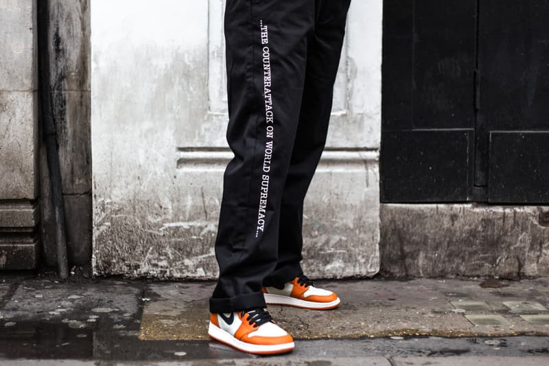 ロンドンにおける Supreme x UNDERCOVER x Public Enemy 最新コラボローンチ日の様子をフォトレポート お国柄が垣間見えるロンドンヘッズたちの指名買いアイテムをチェック UNDERCOVER アンダーカバー ロングアイランド 社会派ヒップホップユニット Public Enemy パブリック・エナミー Supreme シュプリーム 3rdアルバム Fear of a Black Planet ダウンジャケット 開襟シャツ Dr. Martens ドクターマーチン 3ホールシューズ Nike ナイキ adidas アディダス トラックジャケット スウェットパーカ シーズナブル ステッカー ポスター HYPEBEAST ハイプビースト