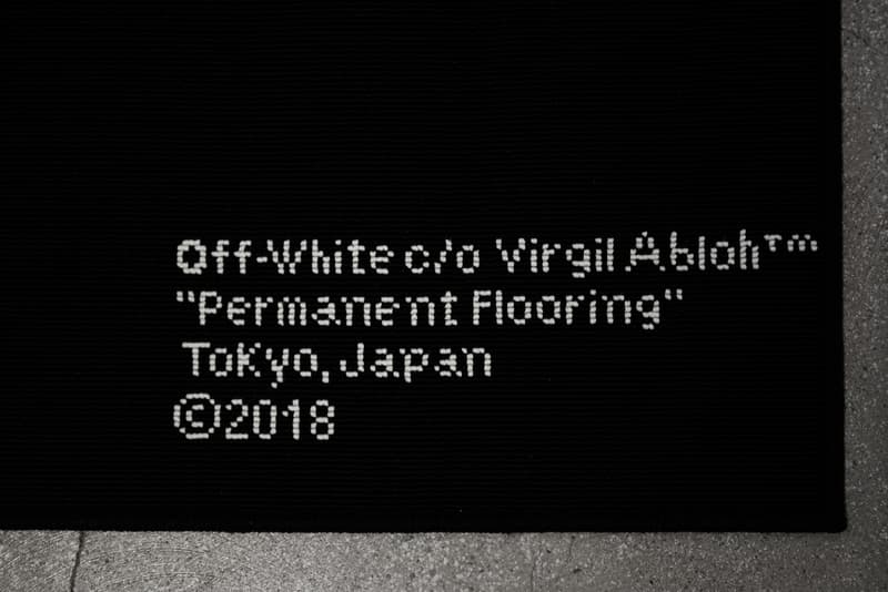 ヴァージル・アブロー初の個展 “PAY PER VIEW” に潜入 メディアや広告に踊らされ、消費によって形作られる現代社会へ向けた異才からのメッセージを体感せよ 良くも悪くもメディアや広告に踊らされ、消費によって形作られる現代社会へ向けた異才からのメッセージ 3月16日(金)より、『Kaikai Kiki Gallery』ではVirgil Abloh(ヴァージル・アブロー)の個展“PAY PER VIEW”が開催されている。「俺たちは全員、消費という行為によって形作られている」、そんなキャッチコピーを掲げる本展では、メディアが人類による世界の見方にいかに重大な影響を与えているのかを示すものだ。 ひとつめの部屋の中央には、モーターレース「NASCAR(ナスカー)」の公式スポンサーである石油会社「SUNOCO(スノコ)」の脚の折れたガソリンスタンド看板が鎮座。また、そのアートピースを背にした正面には、「“ADVERTISE HERE”」の文字が書かれたキャンバスが設置されているが、その下に添えられている電話番号「+1-855-633-9483」はVirgil本人のTwitterにも記載があり、実際にここに電話をかけると〈Off-White™️(オフホワイト)〉のデザイナーが2016年春のコレクション“Blue Collar”の説明をしてくれるのだ。また、ローラーなどは一切使用せず、黒い油絵具と画筆で塗り潰された3,000cm x 1,000cmのキャンバスは、戦前に抽象絵画を手掛けた最初の人物、Kasimir Malevich(カジミール・マレーヴィチ)の作品「黒の正方形」にインスパイアされている。美術史に大きな足跡を残し、存在論や認識論など様々な角度から分析されたこの名画は、視覚的刺激や意味をなすものを排除した完全なる抽象画であるが、Virgilが一人で描き上げたキャンバスの下には、「JCDecaux(ジーセードコー)」、「OUTFRONT(アウトフロント)」、「LAMAR(ラマー)」といった広告企業のロゴが配置。VirgilはMalevichの対話のルールを使って線と線をつなぎ、鑑賞者は広告が持つ力を突き詰めて蒸留したところに残る核心である、という内在的な意図を解き明かしているのだ。 一方、奥の部屋は床一面が畳に。中央に置かれたサイネージに流れてるのは、バルセロナで撮影した〈Off-White™️〉のコレクションムービーだが、「Coca-Cola(コカ・コーラ)」、「DASANI(ダサニ)」、「Perrier(ペリエ)」など、世界的知名度を持つ飲料のロゴを表示するアナログな作品と、スプレーペイントを施した4枚綴りのキャンバスが同居することにより、言葉にしがたい不思議な感覚に陥る空間のミスマッチが生じている。 “PAY PER VIEW”の展示の様子は上のフォトギャラリーよりご確認いただけるが、作品を俯瞰で捉え、感覚を研ぎ澄ますことで伝わってくるVirgilのメッセージはこの空間でしか感じることができない。以下の会期とご自身のスケジュールを照らし合わせ、是非『Kaikai Kiki Gallery』まで足を運んでみてはいかがだろうか。 Virgil Abloh “PAY PER VIEW” @ Kaikai Kiki Gallery 住所:東京都港区元麻布2-3-30 元麻布クレストビルB1 会期:2018年3月16日(金)〜4月1日(日) 時間:11:00 – 19:00 休館日:日、月、祝(最終日の4月1日のみ日曜営業)