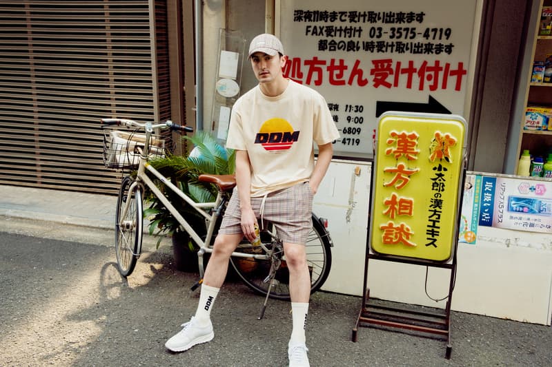 ユース世代に古き良き80年代の魅力を伝える DRÔLE DE MONSIEUR 2018年春夏カプセルコレクション 日本で撮影されたルックブックではヴィンテージを彷彿させるアイコニックなサンセットロゴをフィーチャー
