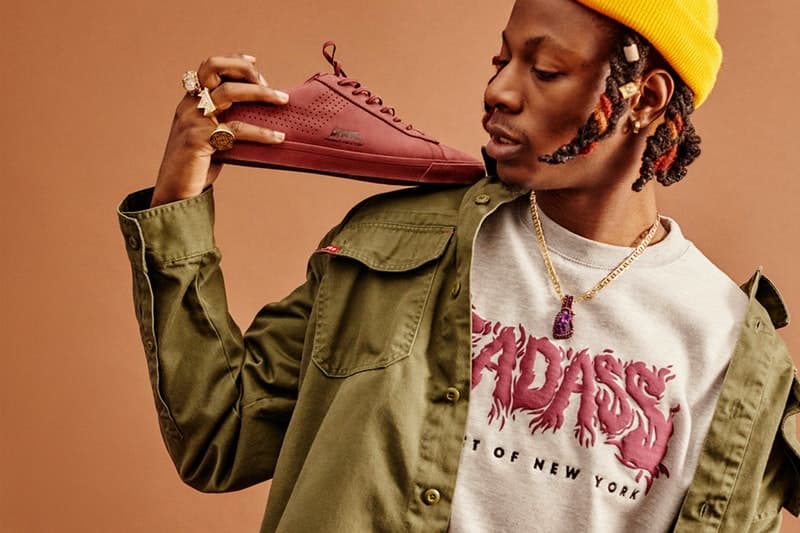 弱冠23歳のカリスマラッパー Joey Bada$$ が PONY とのカプセルコレクション第1弾を発表 定番モデルとして認知される特別仕様のTopstar Lo Luxに加え、異例のアパレルアイテムがラインアップ Pro Era プロ エラ ラッパー カリスマ 23歳 Joey Bada$$ ジョーイ・バッドアス PONY ポニー Topstar Lo Lux マルーンカラー テキストグラフィック クルーネックスウェット Urban Outfitters オンラインストア HYPEBEAST ハイプビースト