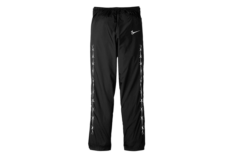 Fear of God が新鋭ブランド BILL by Warren Lotas を迎えたコラボカプセルを発表 有刺鉄線や〈Nike〉のスウッシュなど、強烈なアイコングラフィックを踏襲したアパレル5型が登場 UNITED ARROWS & SONS ESSENTIALS エッセンシャルズ Jerry Lorenzo ジェリー・ロレンゾ Fear of God フィア オブ ゴッド Warren Lotas ウォレン・ロータス Wiz Khalifa ウィズ・カリファ Bill Warren Lotas 有刺鉄線 十字架 フーディ ライダース Nike ナイキ スウッシュ トラックパンツ HYPEBEAST ハイプビースト