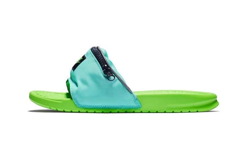 Nike からベルトをまさかのジップ付きのポーチに改良した斬新な Benassi JDI が登場 足元にひとネタ仕込みたいという方は是非 夏になると頭角を表す〈Nike(ナイキ)〉のスライドサンダル、Benassi JDIから斬新すぎる新パッケージが登場。“Fanny Pack”とタイトルでもそのユーモラスなアプローチを宣言している本コレクションは、ブラック/グレーとともに夏に映えるビビッドな配色を採用し、サンダルのベルト部分がジップ付きのポーチへと改良されている。これによりスライドサンダルに若干の機能性が追加されたが、果たしてどのように使うべきなのか。容量を考えても鍵や小銭などが理想的かもしれない。 もし自分がコンビニやビーチサイドなどの店員で、お会計の際に片足立ちをしてサンダルから小銭を取り出すお客さんに遭遇したらと妄想すると……。Benassi JDI “Fanny Pack”は、まもなく〈Nike〉の取扱店舗にデリバリーされるとのこと。足元に小ネタを仕込みたいという方は、ブランドからのアップデートをお見逃しなく。 サンダルをお探しの方は、オリジナルレオパードを落とし込んだ〈SUICOKE(スイコック)〉x〈WACKO MARIA(ワコ マリア)〉のビーチサンダルや、ミリタリーな配色が購買意欲を駆り立てる〈Teva®(テバ)〉と〈PORTER(ポーター)〉のストラップ付きサンダルなどもあわせてチェックしてみてはいかがだろうか。