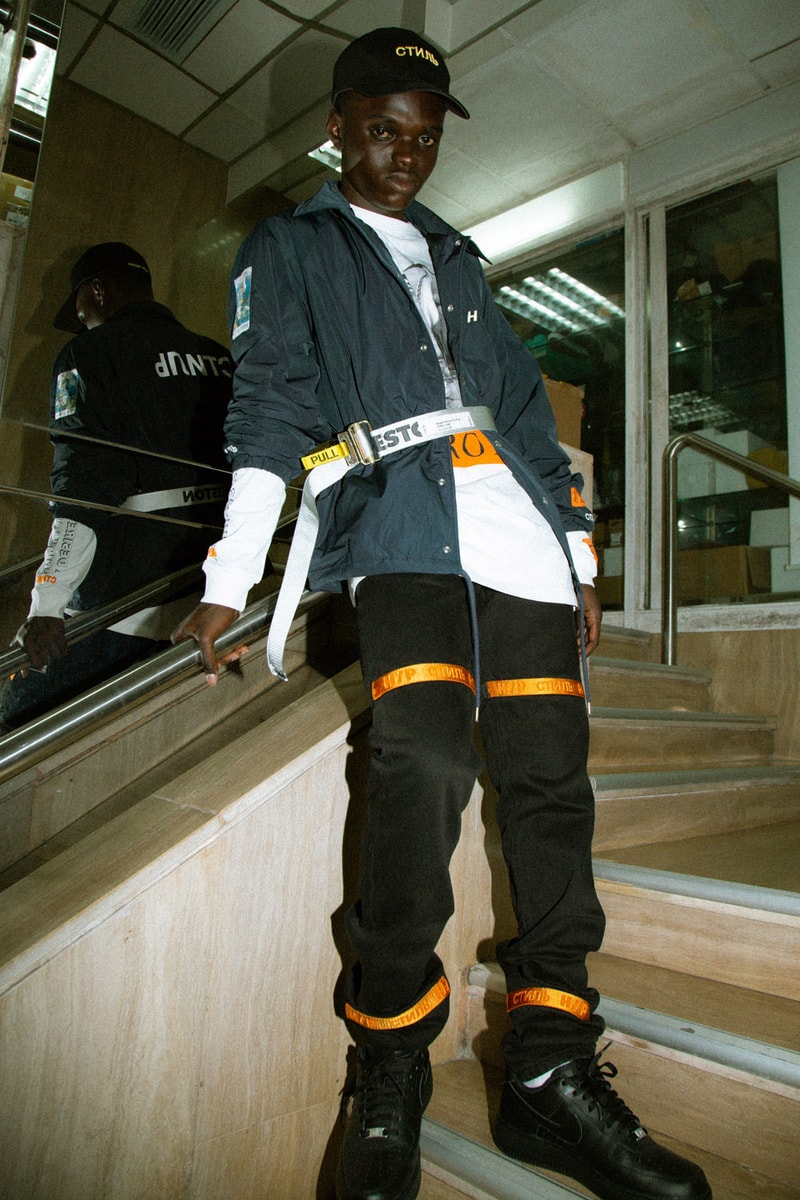 Heron Preston 2018年秋冬コレクションを紐解く HBX の最新エディトリアル ヴァージルやカニエも実力を認めた次世代ストリートの雄にフィーチャー SSENSE エッセンス Heron Preston ヘロン プレストン Kanye West カニエ・ウェスト Virgil Abloh ヴァージル・アブロー HBX ロングスリーブTシャツ アンクル丈ブーツ パイソンプリント ウエストバッグ ミリタリー ワーク HYPEBEAST ハイプビースト