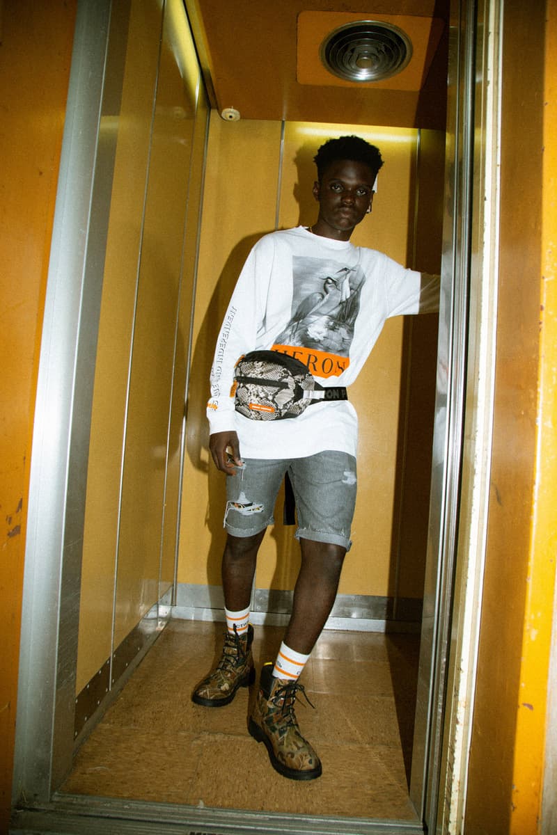 Heron Preston 2018年秋冬コレクションを紐解く HBX の最新エディトリアル ヴァージルやカニエも実力を認めた次世代ストリートの雄にフィーチャー SSENSE エッセンス Heron Preston ヘロン プレストン Kanye West カニエ・ウェスト Virgil Abloh ヴァージル・アブロー HBX ロングスリーブTシャツ アンクル丈ブーツ パイソンプリント ウエストバッグ ミリタリー ワーク HYPEBEAST ハイプビースト