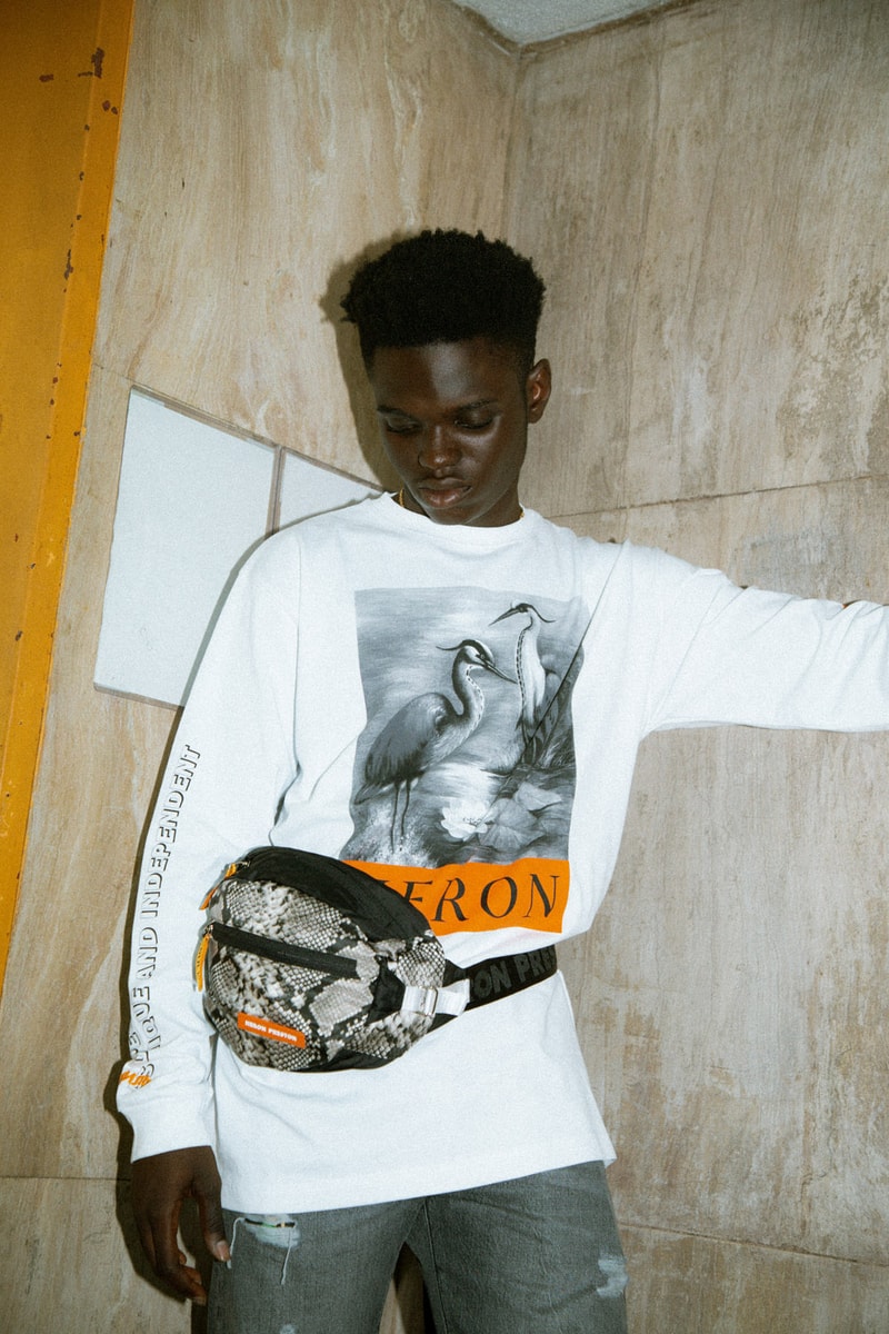 Heron Preston 2018年秋冬コレクションを紐解く HBX の最新エディトリアル ヴァージルやカニエも実力を認めた次世代ストリートの雄にフィーチャー SSENSE エッセンス Heron Preston ヘロン プレストン Kanye West カニエ・ウェスト Virgil Abloh ヴァージル・アブロー HBX ロングスリーブTシャツ アンクル丈ブーツ パイソンプリント ウエストバッグ ミリタリー ワーク HYPEBEAST ハイプビースト