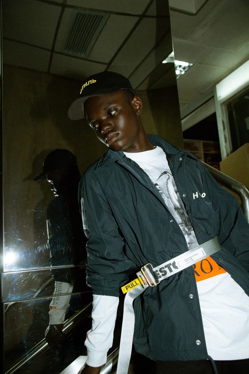 Heron Preston 2018年秋冬コレクションを紐解く HBX の最新エディトリアル ヴァージルやカニエも実力を認めた次世代ストリートの雄にフィーチャー SSENSE エッセンス Heron Preston ヘロン プレストン Kanye West カニエ・ウェスト Virgil Abloh ヴァージル・アブロー HBX ロングスリーブTシャツ アンクル丈ブーツ パイソンプリント ウエストバッグ ミリタリー ワーク HYPEBEAST ハイプビースト