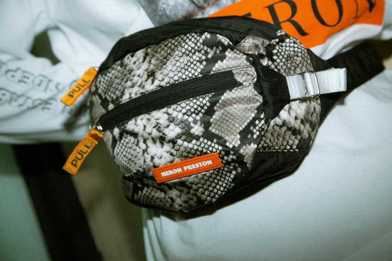 Heron Preston 2018年秋冬コレクションを紐解く HBX の最新エディトリアル ヴァージルやカニエも実力を認めた次世代ストリートの雄にフィーチャー SSENSE エッセンス Heron Preston ヘロン プレストン Kanye West カニエ・ウェスト Virgil Abloh ヴァージル・アブロー HBX ロングスリーブTシャツ アンクル丈ブーツ パイソンプリント ウエストバッグ ミリタリー ワーク HYPEBEAST ハイプビースト