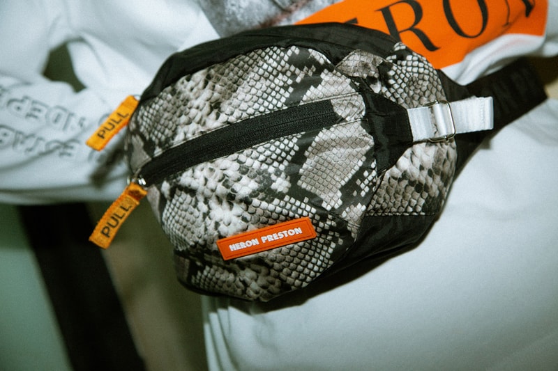 Heron Preston 2018年秋冬コレクションを紐解く HBX の最新エディトリアル ヴァージルやカニエも実力を認めた次世代ストリートの雄にフィーチャー SSENSE エッセンス Heron Preston ヘロン プレストン Kanye West カニエ・ウェスト Virgil Abloh ヴァージル・アブロー HBX ロングスリーブTシャツ アンクル丈ブーツ パイソンプリント ウエストバッグ ミリタリー ワーク HYPEBEAST ハイプビースト