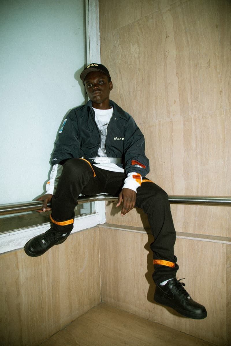 Heron Preston 2018年秋冬コレクションを紐解く HBX の最新エディトリアル ヴァージルやカニエも実力を認めた次世代ストリートの雄にフィーチャー SSENSE エッセンス Heron Preston ヘロン プレストン Kanye West カニエ・ウェスト Virgil Abloh ヴァージル・アブロー HBX ロングスリーブTシャツ アンクル丈ブーツ パイソンプリント ウエストバッグ ミリタリー ワーク HYPEBEAST ハイプビースト