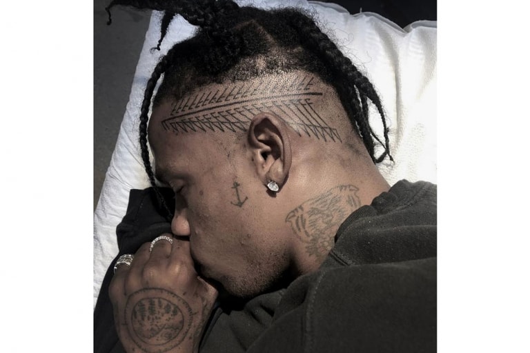Travis Scott がこめかみ部分に入れた新たな民族柄タトゥーを公開 Hypebeast Jp Travis Scott がこめかみ部分に入れた新たな民族柄タトゥーを公開 Hypebeast Jp