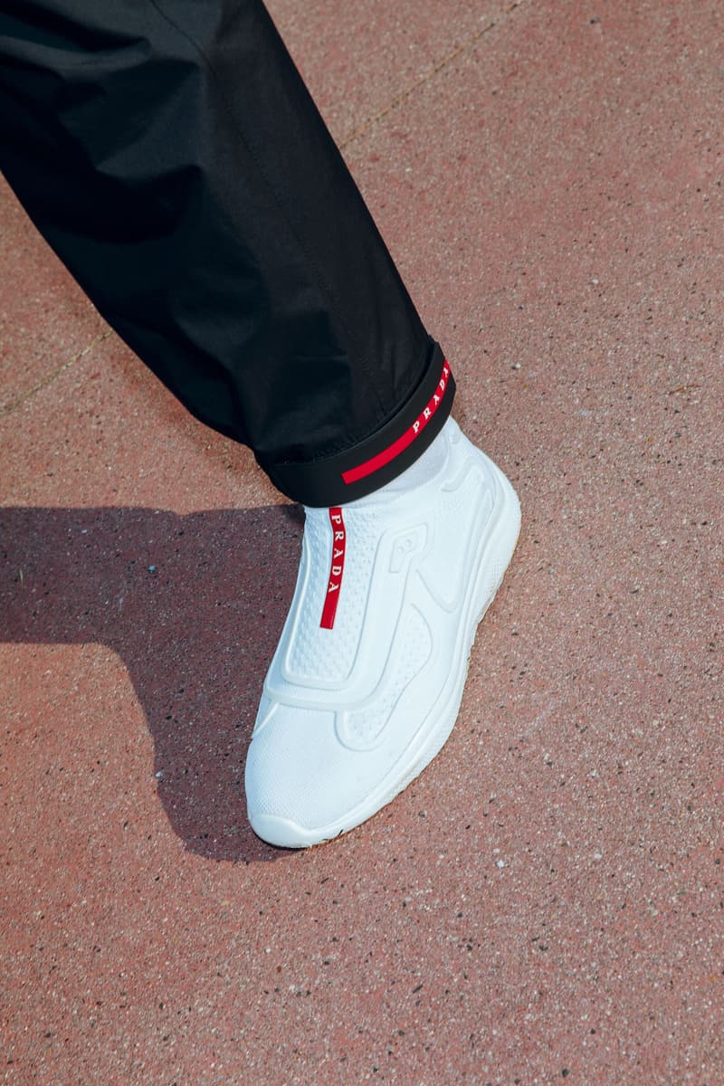 Prada Sports nss magazine linea rossa editorial fall winter 2018 sneakers white blue orange black tracksuit hoodie pants turtleneck logo