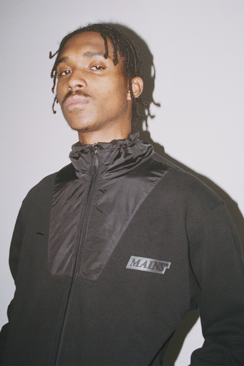 スケプタ　メインズ　Skepta Mains London Second Drop Pop Up Store Lookbook Fashion Clothing Signature Style Tracksuits T-Shirts Bag Styles Hats Webstore Monday 26 November Shop Drop Saturday 24 25 Soho, London 15 Bateman St W1D 3AQ
