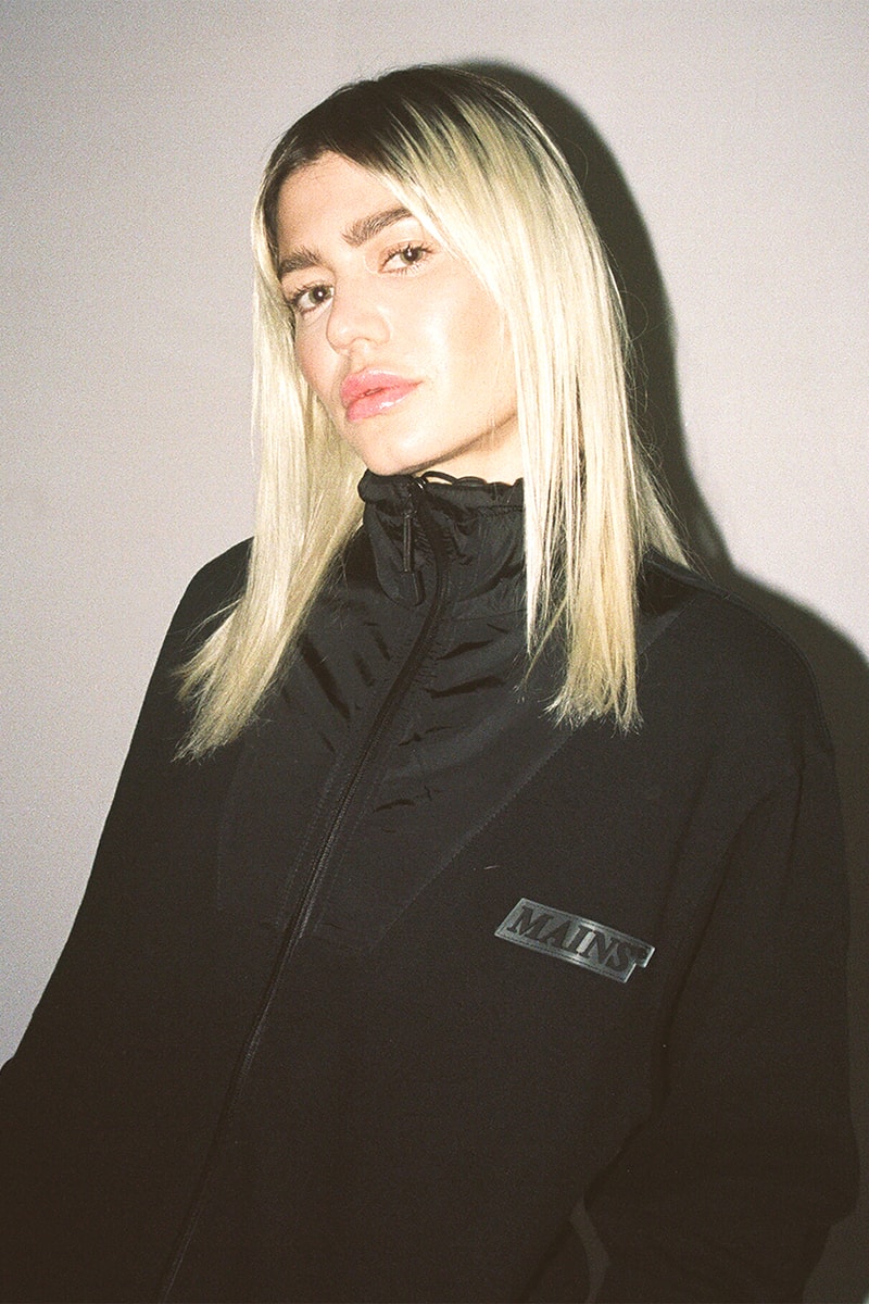スケプタ　メインズ　Skepta Mains London Second Drop Pop Up Store Lookbook Fashion Clothing Signature Style Tracksuits T-Shirts Bag Styles Hats Webstore Monday 26 November Shop Drop Saturday 24 25 Soho, London 15 Bateman St W1D 3AQ