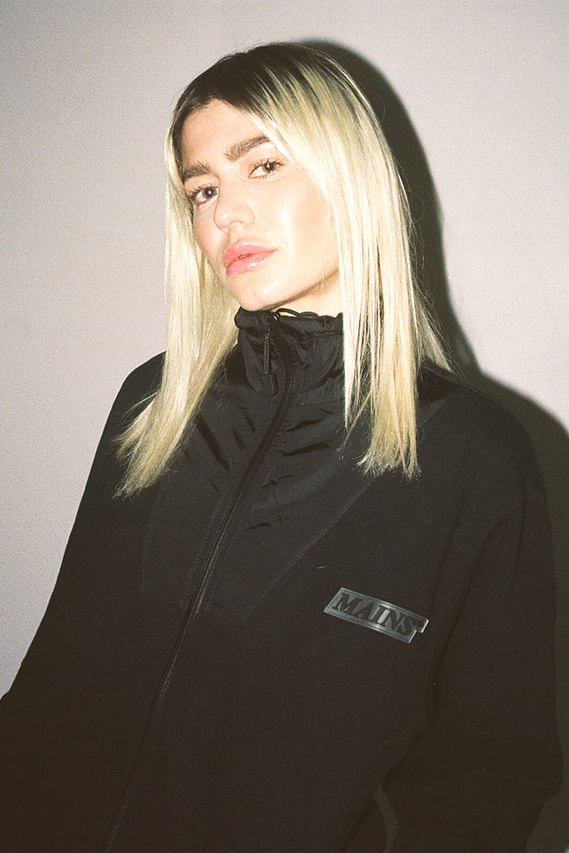 スケプタ メインズ Skepta Mains London Second Drop Pop Up Store Lookbook Fashion Clothing Signature Style Tracksuits T-Shirts Bag Styles Hats Webstore Monday 26 November Shop Drop Saturday 24 25 Soho, London 15 Bateman St W1D 3AQ