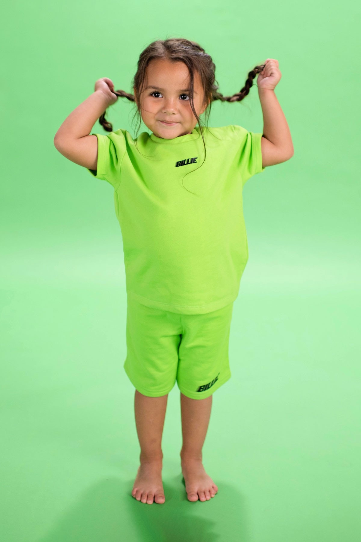 Billie Eilish ビリー・アイリッシュ Launches ベビー Kids キッズ & Infants Clothing Line merch lookbooks lime green graphics merch  ブローシュ マーチコレクション