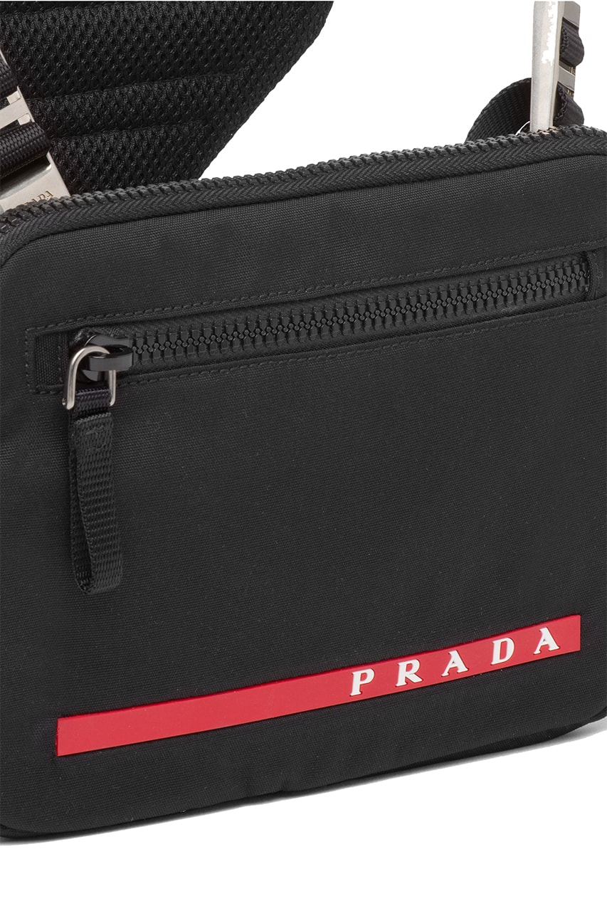 プラダから再生ナイロン製のチェストバックがリリース prada crossbody chest rig bag technical functional red Linea Rossa latex label designer luxury fashion streetwear accessories triangle logo  