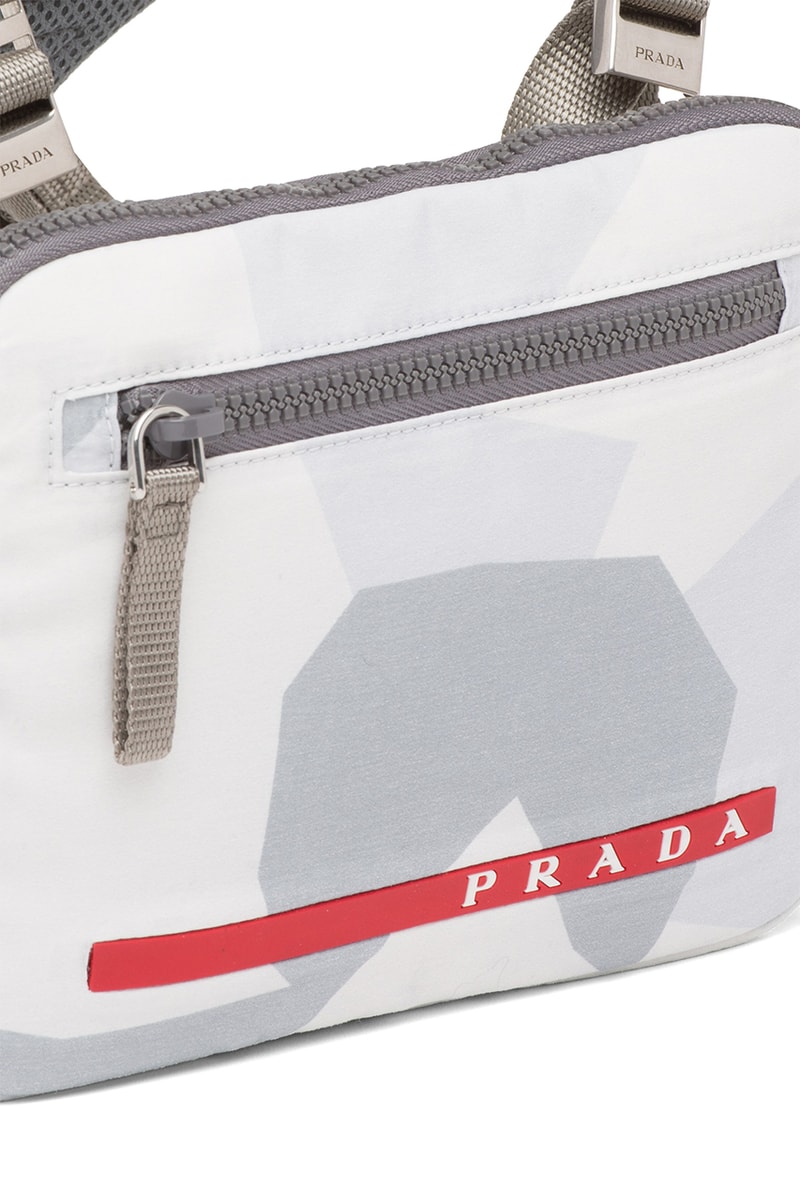 プラダから再生ナイロン製のチェストバックがリリース prada crossbody chest rig bag technical functional red Linea Rossa latex label designer luxury fashion streetwear accessories triangle logo  