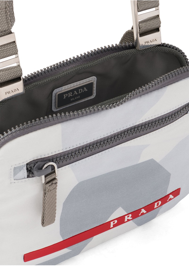 プラダから再生ナイロン製のチェストバックがリリース prada crossbody chest rig bag technical functional red Linea Rossa latex label designer luxury fashion streetwear accessories triangle logo  