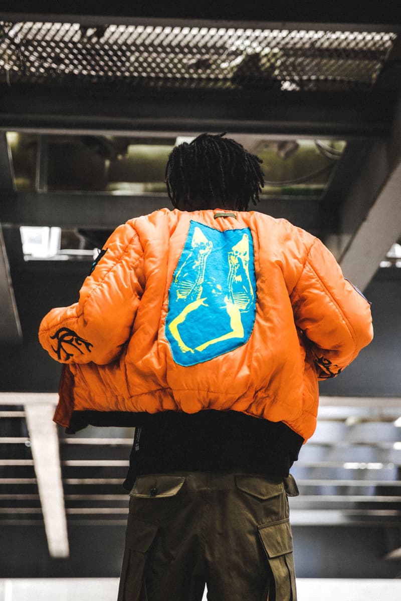 シベリア ヒルズ フォステックス ガーメンツ FOSTEX GARMENTS からビリー・アイリッシュのマーチで知られる SIBERIA HILLS とのコラボピースが HBX 限定で登場