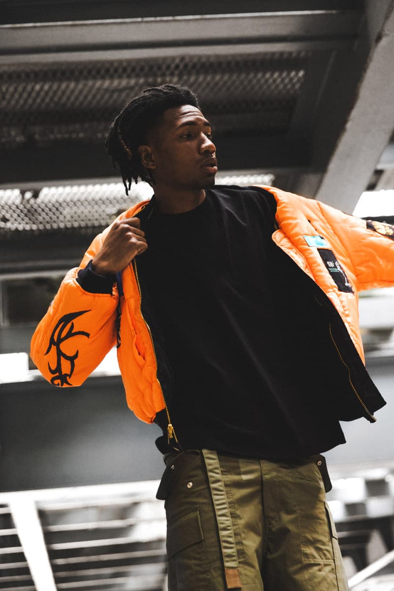 シベリア ヒルズ フォステックス ガーメンツ FOSTEX GARMENTS からビリー・アイリッシュのマーチで知られる SIBERIA HILLS とのコラボピースが HBX 限定で登場