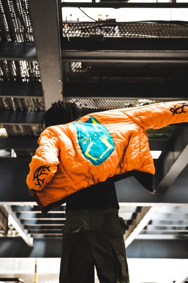 シベリア ヒルズ フォステックス ガーメンツ FOSTEX GARMENTS からビリー・アイリッシュのマーチで知られる SIBERIA HILLS とのコラボピースが HBX 限定で登場