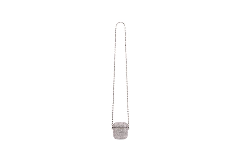 Balenciaga からまばゆく光るストーンを敷き詰めた AirPods ケースとリングが登場 Balenciaga Glam Apple AirPods Earpods Case Aged Silver Brass White Clear Rinestones Phone Ring Holder Demna Gvasalia Fall Winter 2021 Tech Accessories Paris Hilton Y2K Glamor Glitzy Diamond Shiney