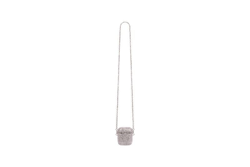 Balenciaga からまばゆく光るストーンを敷き詰めた AirPods ケースとリングが登場 Balenciaga Glam Apple AirPods Earpods Case Aged Silver Brass White Clear Rinestones Phone Ring Holder Demna Gvasalia Fall Winter 2021 Tech Accessories Paris Hilton Y2K Glamor Glitzy Diamond Shiney