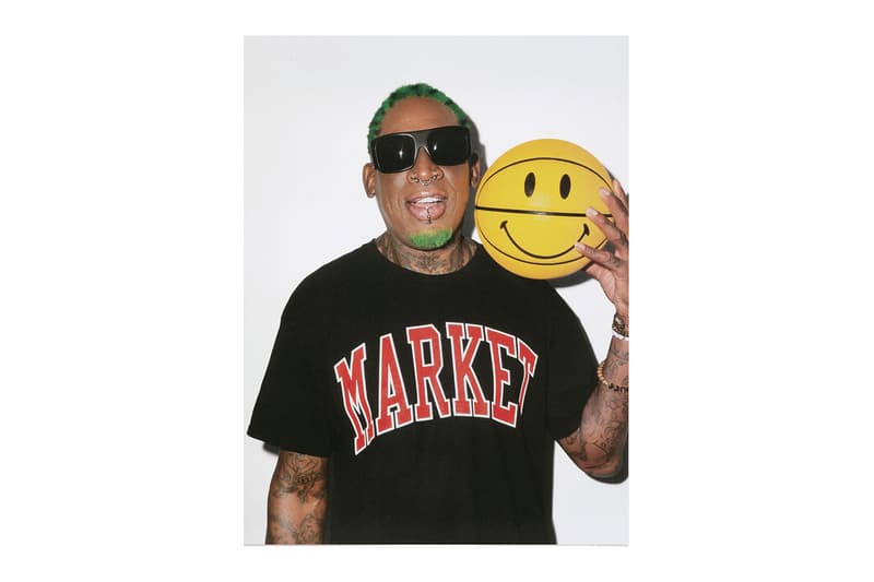 マーケットからデニス・ロッドマンとのコラボカプセルコレクションが到着　MA®KET Launches a Dennis Rodman Collection pink leopard print hoodies and shorts,  photoshoot tees, poster sets, jerseys bucket hats sweatpants woven blankets and Champion basketball shorts apparel home goods doodles pillows smiley face bridal gown t shirt trucker hat release info date price