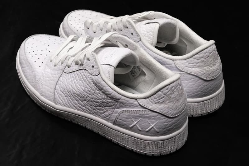 カウズ x ジョーダンブランドによる幻のコラボ エアジョーダン 1 ローをチェック Kaws x Jordan Brand 1 Low Sample Closer Look English Sole sneakers footwear kicks artwork AJ1