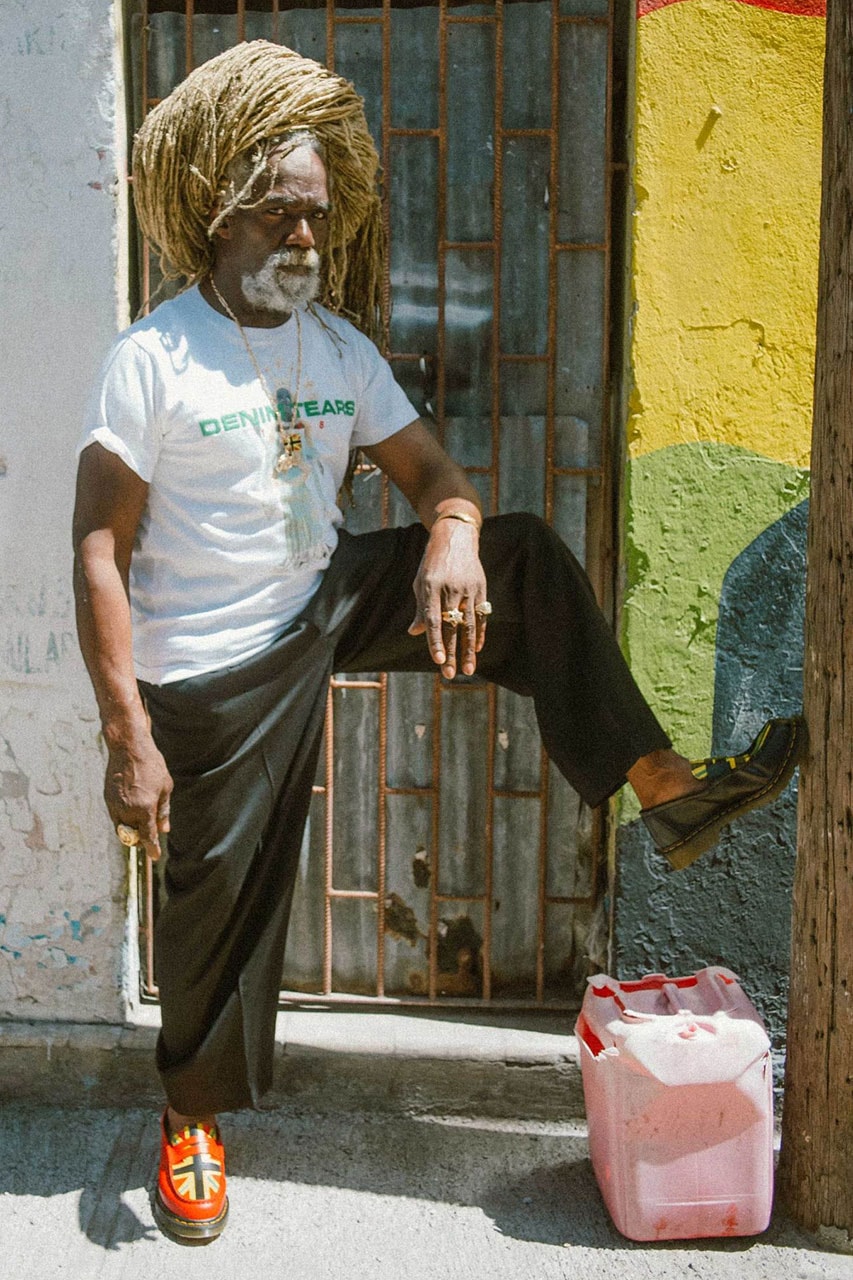 ドクターマーチンxデニム ティアーズから初となるコラボシューズが登場 Dr. Martens x Denim Tears Collaboration Celebrates the Legacy of the Afro-Caribbean Diaspora release info windrush generation paiir of shoes with flag painted tremaine emory supreme