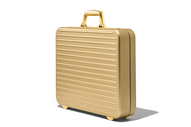 일명 '007 가방'으로 불리는, 리모와의 ‘아타셰 골드 브리프케이스’