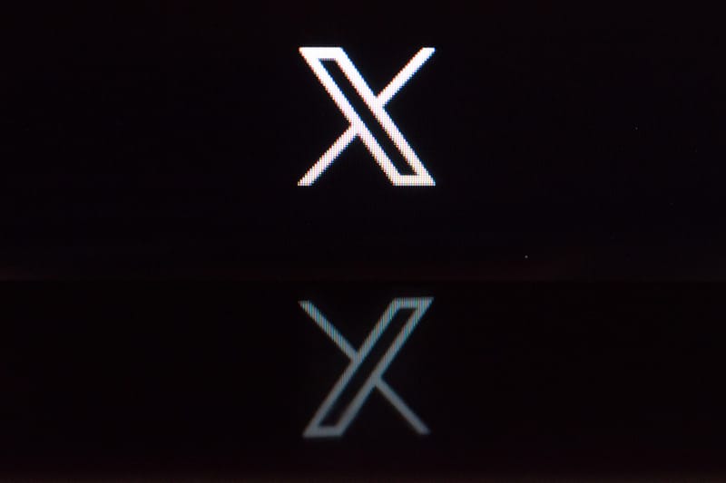 X, ‘싫어요’ 버튼을 테스트하고 있다