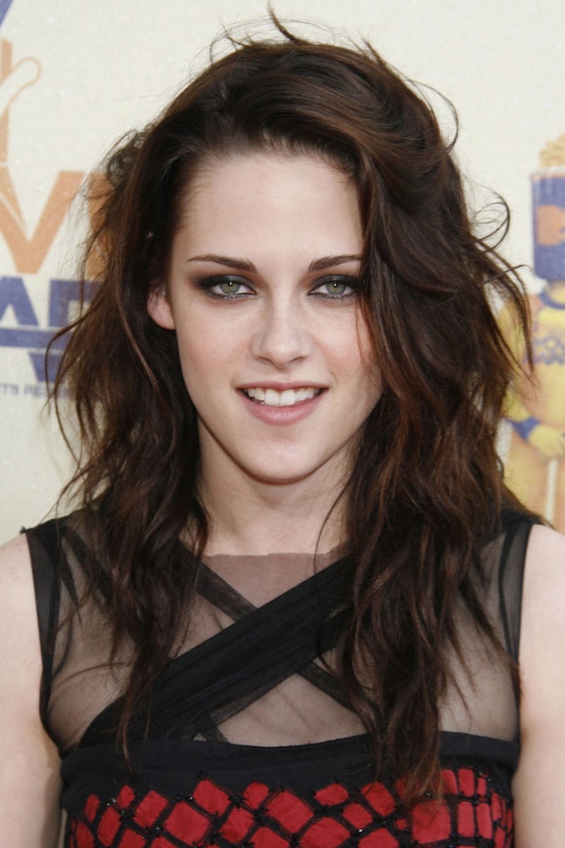 Kristen Stewart beauty evolution long curly hair short hair skin head smokey eyes makeup celebrities hairstyles
