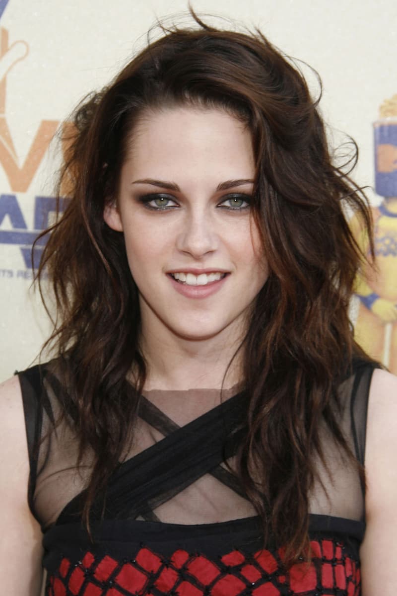 Kristen Stewart beauty evolution long curly hair short hair skin head smokey eyes makeup celebrities hairstyles