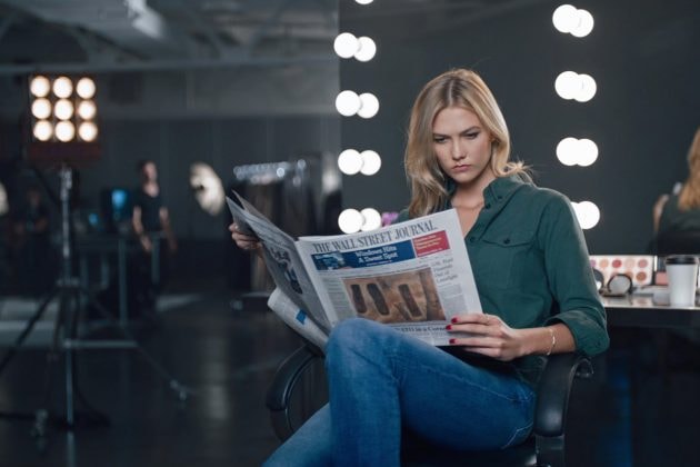 Karlie Kloss Reading Newspaper