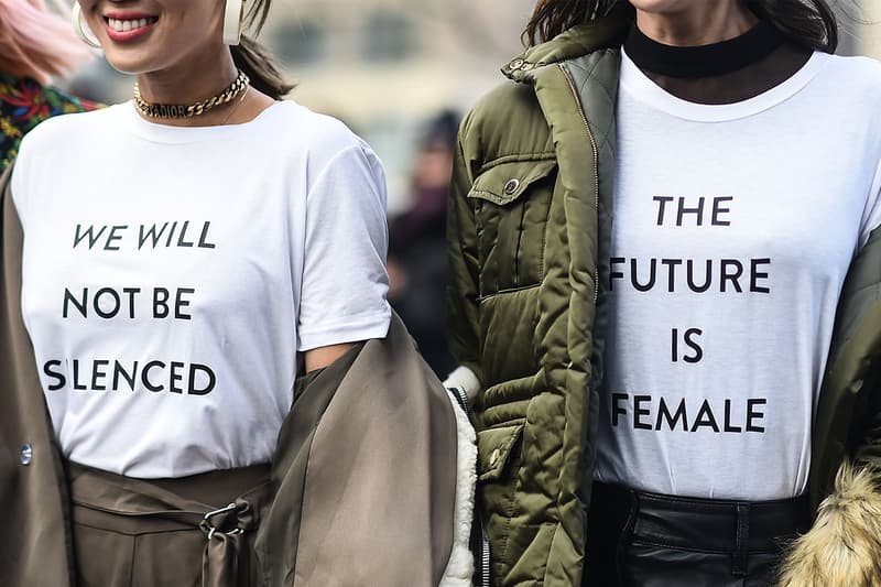 Irene Kim and Aimee Song are seen making a political statement outside of the 3.1 Phillip Lim show during New York Fashion Week: Women's Fall/Winter 2017 on February 13, 2017 in New York City.