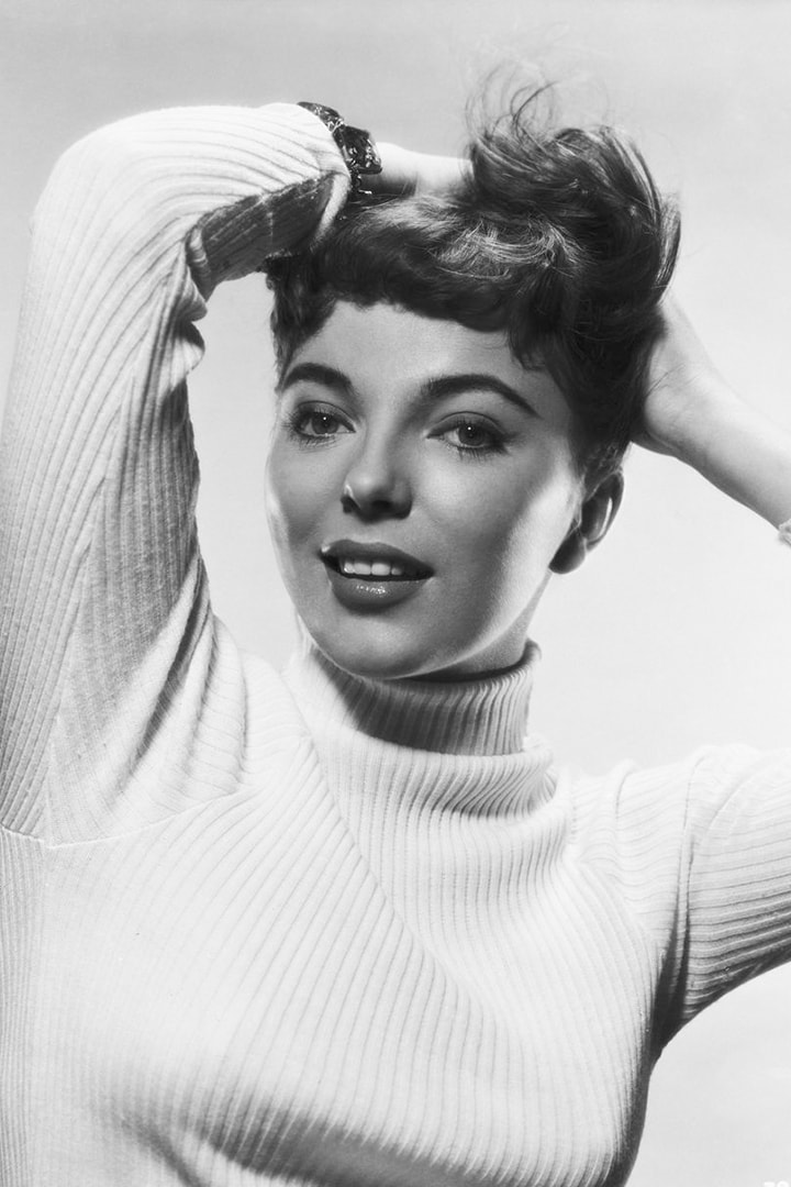 Joan Collins in Turtlenecks