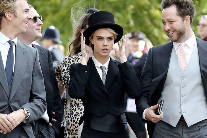 Cara Delevingne 出席皇室婚禮,燕尾服搭高帽帥到殺光所有底片!