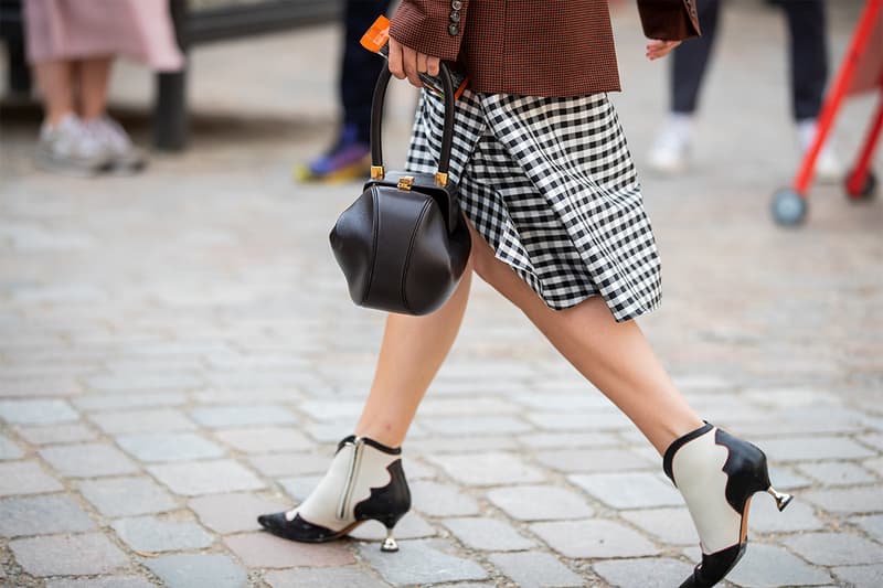 A guest is seen wearing Gabriela Hearst bag outside Designers Remix during Copenhagen Fashion Week Spring/Summer 2020 on August 08, 2019 in Copenhagen, Denmark.