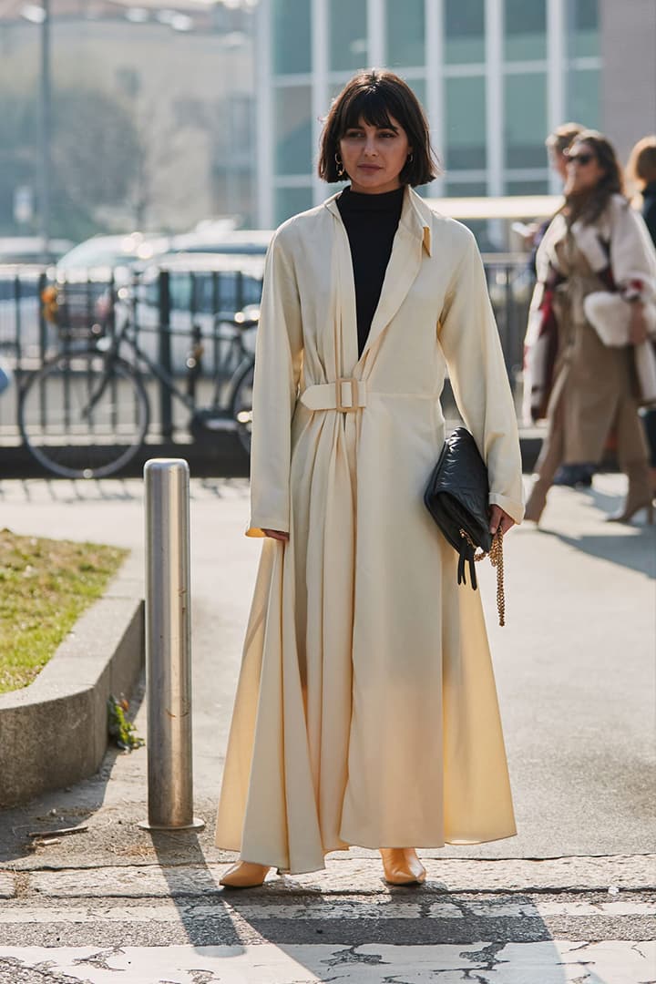 White Coat Black Turtle Neck Outfits Street Style