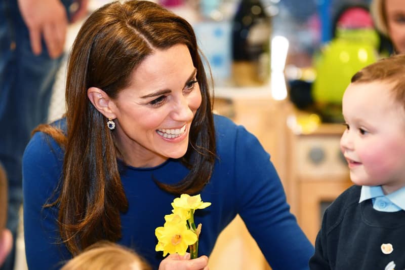 Kate Middleton Duchess of Cambridge Prince William Northern Ireland Royal Visit Malvern Primary School Cinemagic young girl braiding hair Princess Charlotte Mother of Three British Royal family