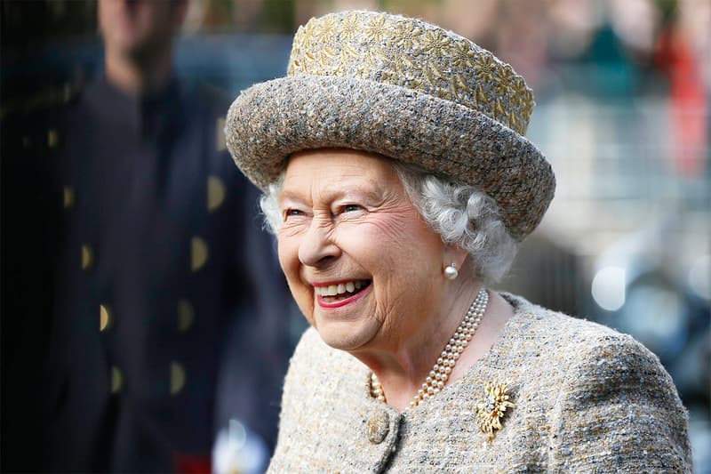 Queen Elizabeth II Balmoral castle Scotland Royal Regiment of Scotland pony mascot bite flower British Royal Family