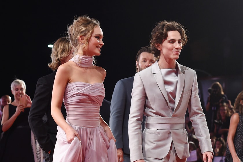 lily-rose depp timothee chalamet the king venice red carpet dress suits